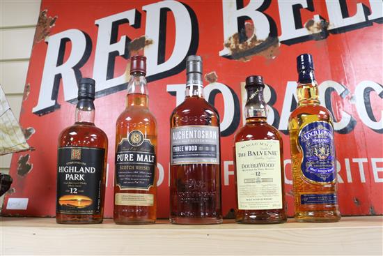 Five assorted bottles of whisky: Highland Park 12yo, Auchentoshan Three Wood, Pure Malt, Balvenie